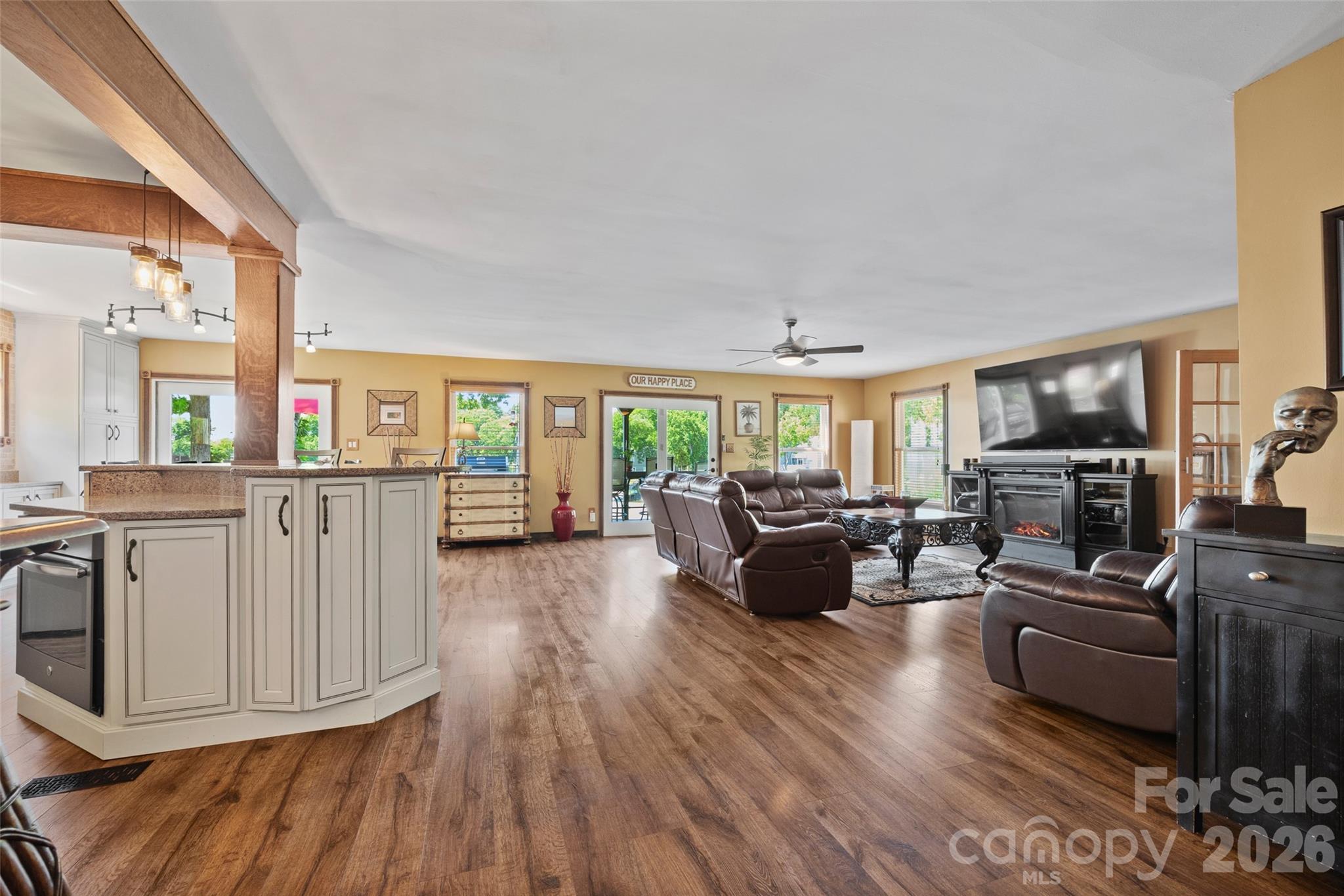 27056 Catamaran Drive Tega Cay, SC 29708 - Photo 10 of 48 a living room with furniture and a flat screen tv