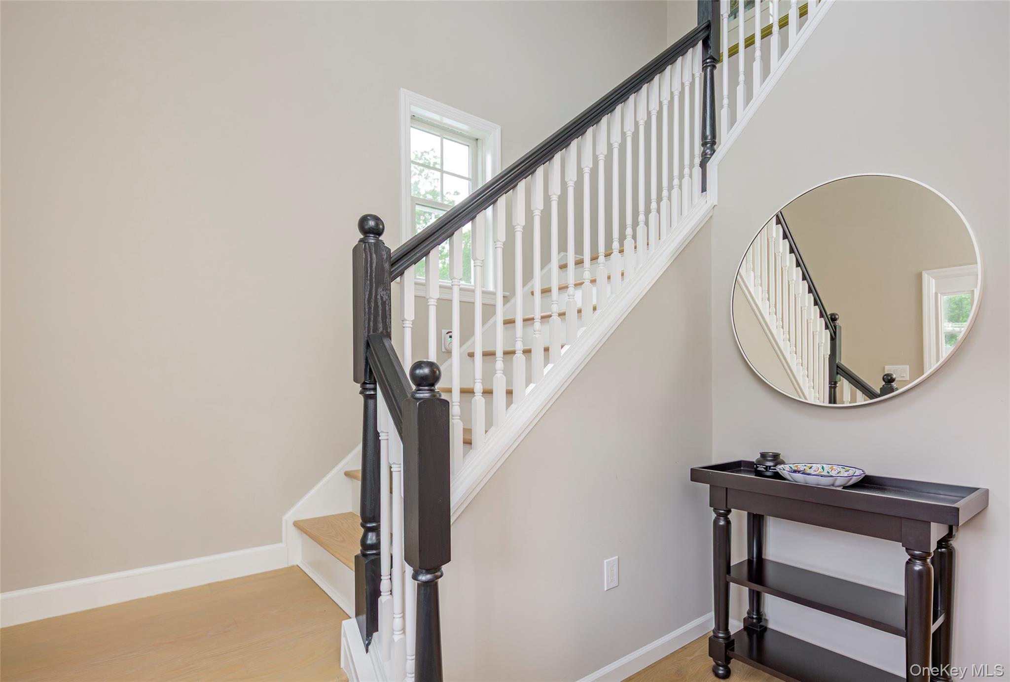 15 South Beach Road Southampton, NY 11968 - Photo 11 of 28 a view of entryway and hall with wooden floor