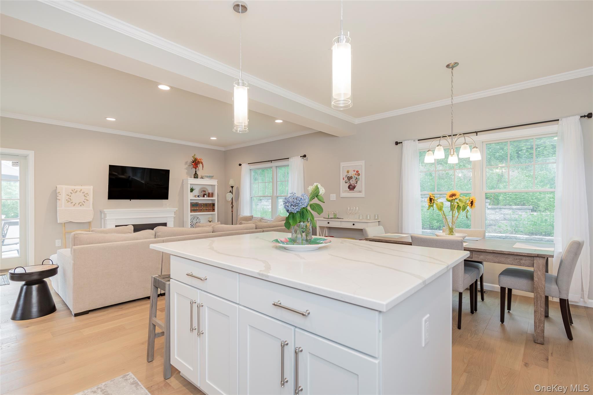 15 South Beach Road Southampton, NY 11968 - Photo 20 of 28 a view of a dining room with furniture window and outside view
