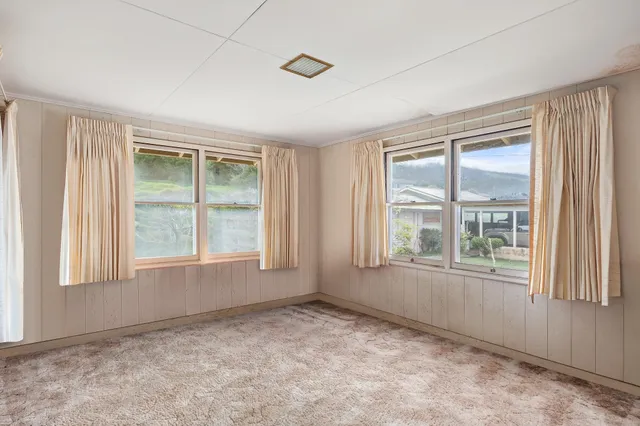 a bathroom with a sink a toilet and a shower