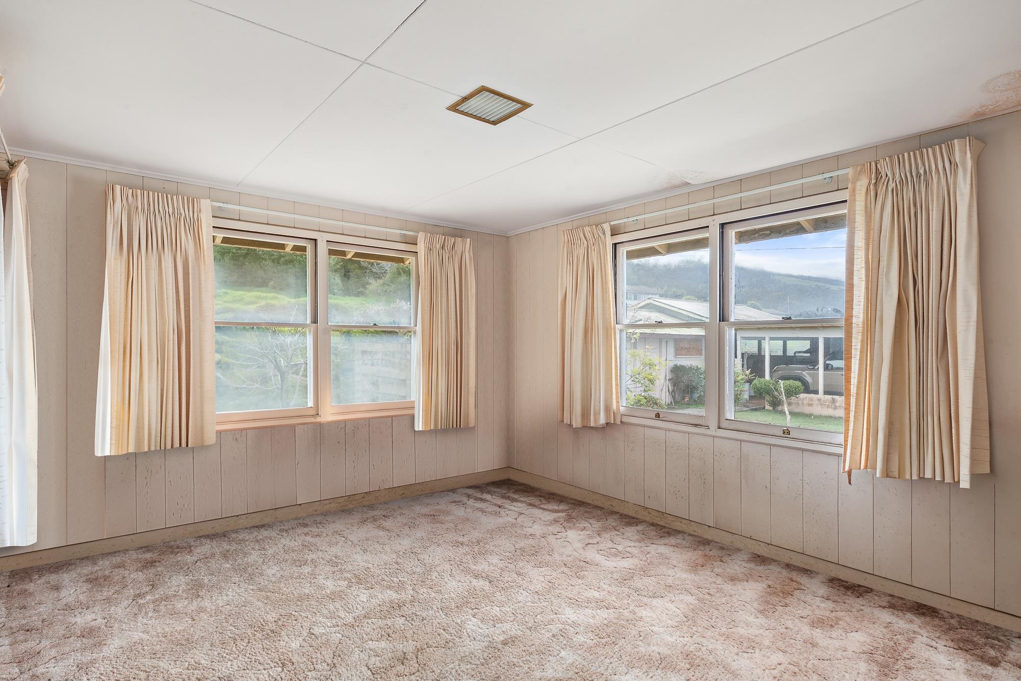 1375 Copp Road Kula, HI 96790 - Photo 14 of 35 an empty room with windows