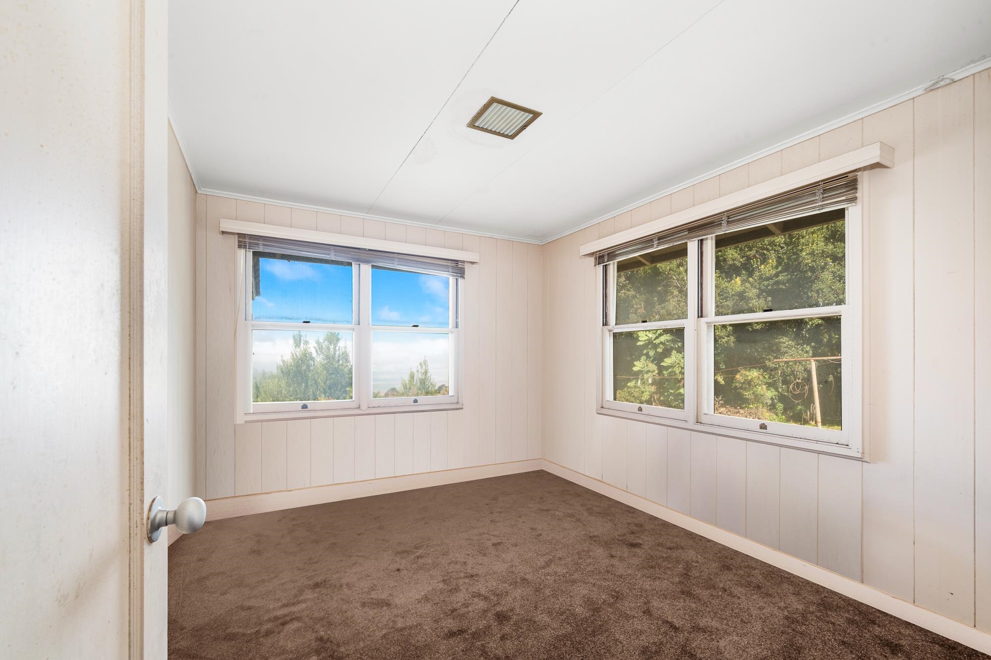 1375 Copp Road Kula, HI 96790 - Photo 17 of 35 an empty room with a window
