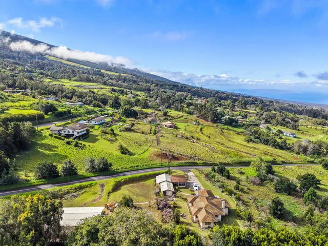 a view of a city with an ocean