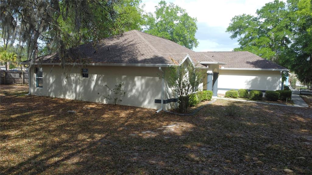 4475 Southwest 115th Street Ocala, FL 34476 - Photo 3 of 35 a view of a yard