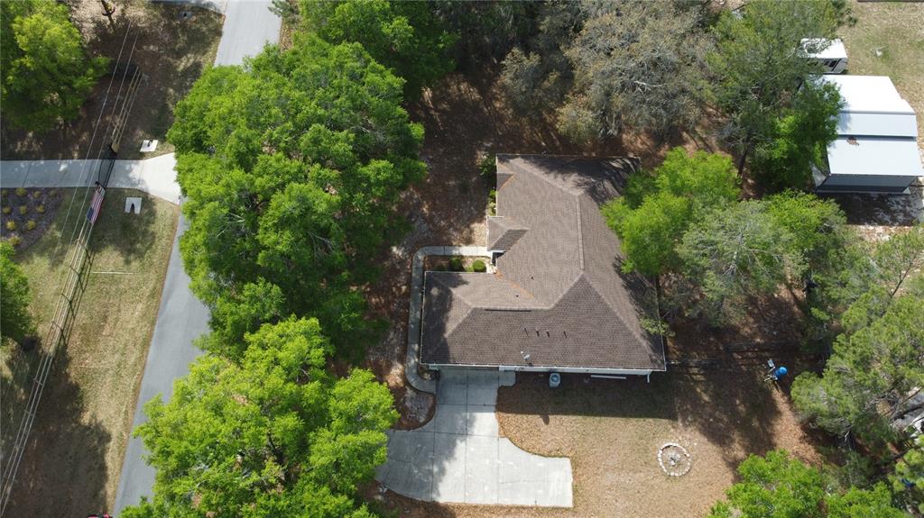4475 Southwest 115th Street Ocala, FL 34476 - Photo 33 of 35 an aerial view of a house with a yard