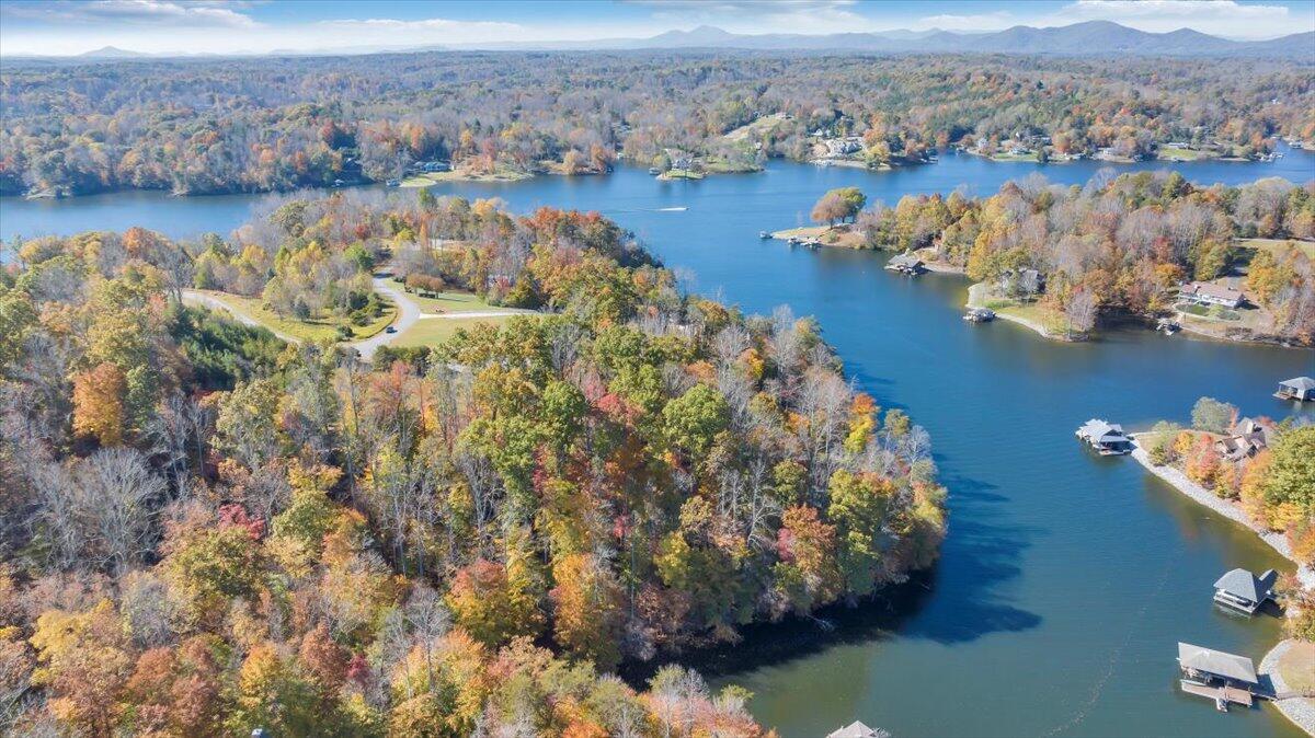 Undisclosed Address Goodview, VA 24095 - Photo 13 of 17 a view of a lake with mountains in the background