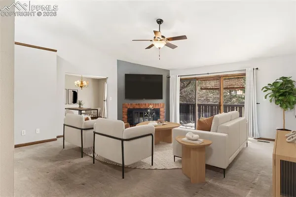 a view of a livingroom with a fireplace