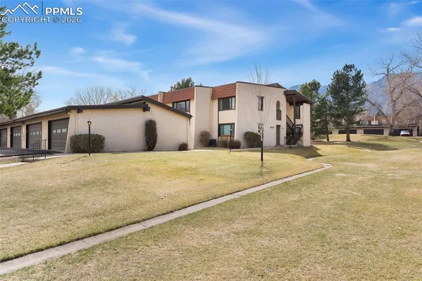 a view of a lake with a building in the background