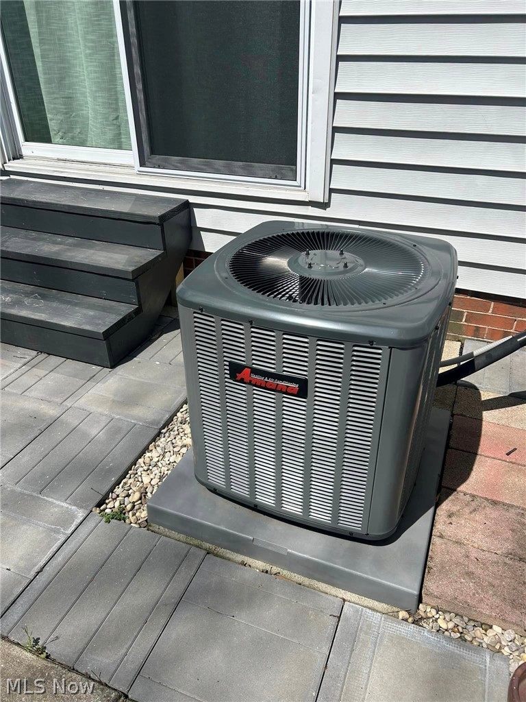 1112 Brainard Road Lyndhurst, OH 44124 - Photo 29 of 34 Exterior details with cooling unit