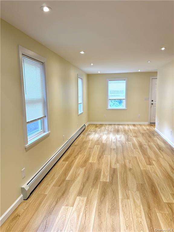 64 Orrs Mills Road, Unit A Salisbury Mills, NY 12577 - Photo 7 of 18 a view of an empty room and window