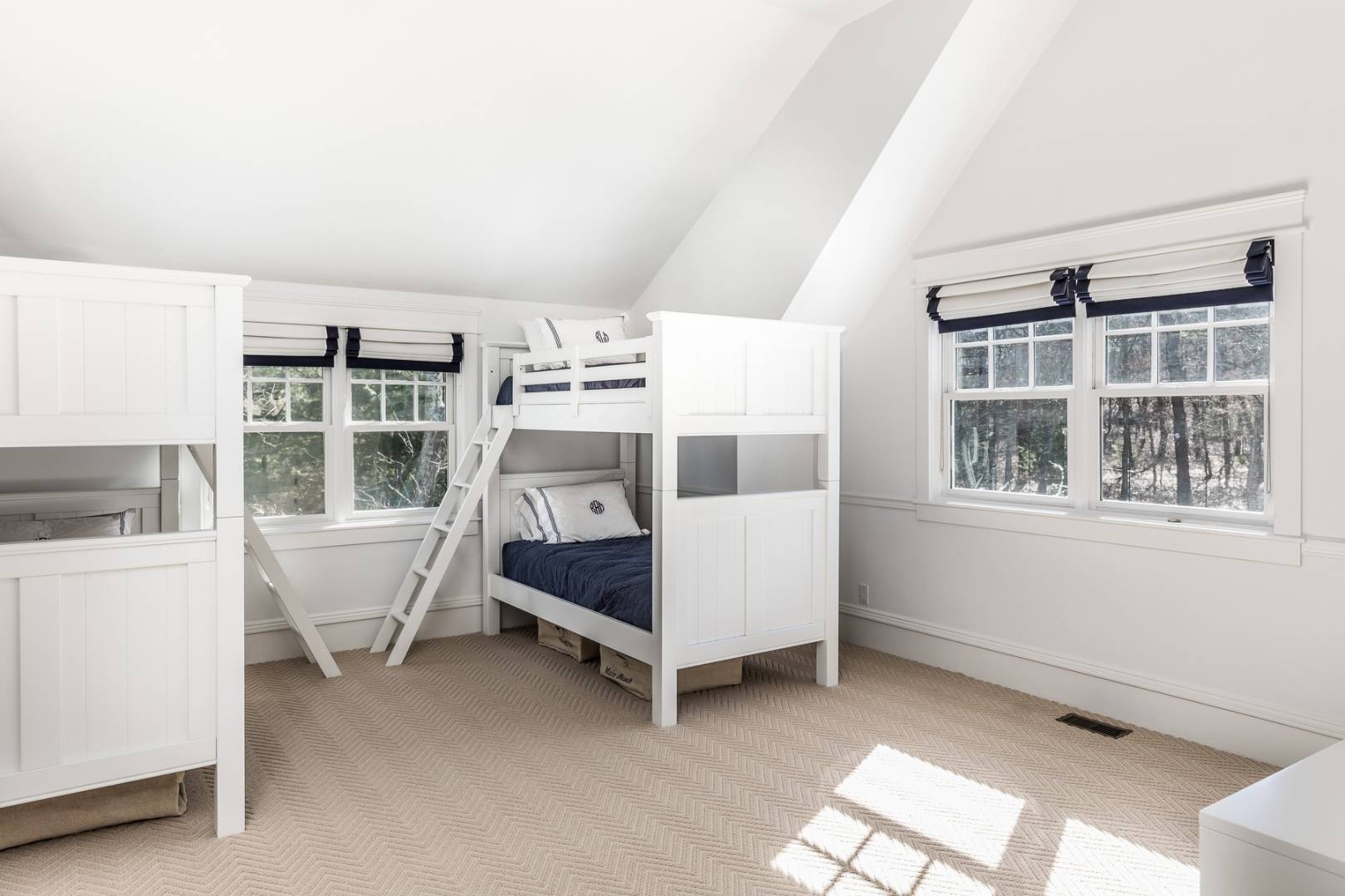 17 Long Hill Road East Hampton, NY 11937 - Photo 8 of 10 a bed room with a bed and a window