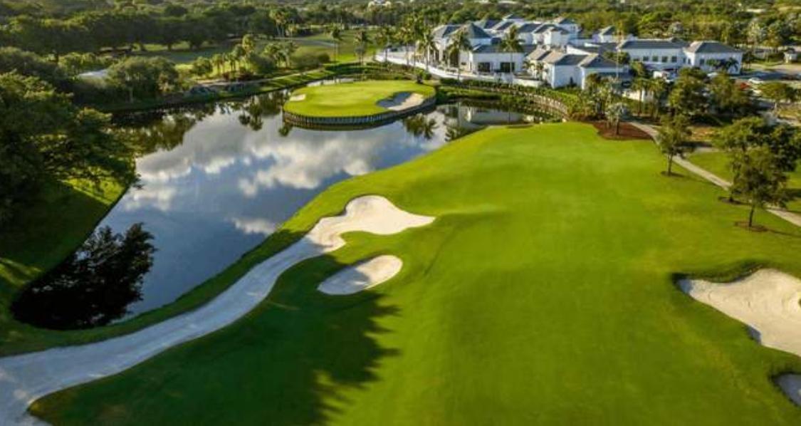 2299 Northwest 55th Street Boca Raton, FL 33496 - Photo 40 of 47 a view of a swimming pool with a yard