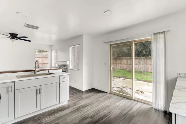 a view of a kitchen and a sink