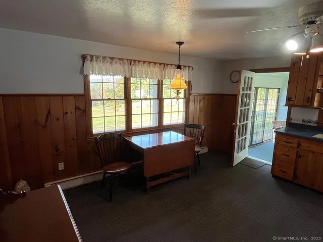 a view of staircase from balcony