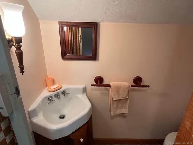 a room with a bed furniture and a window