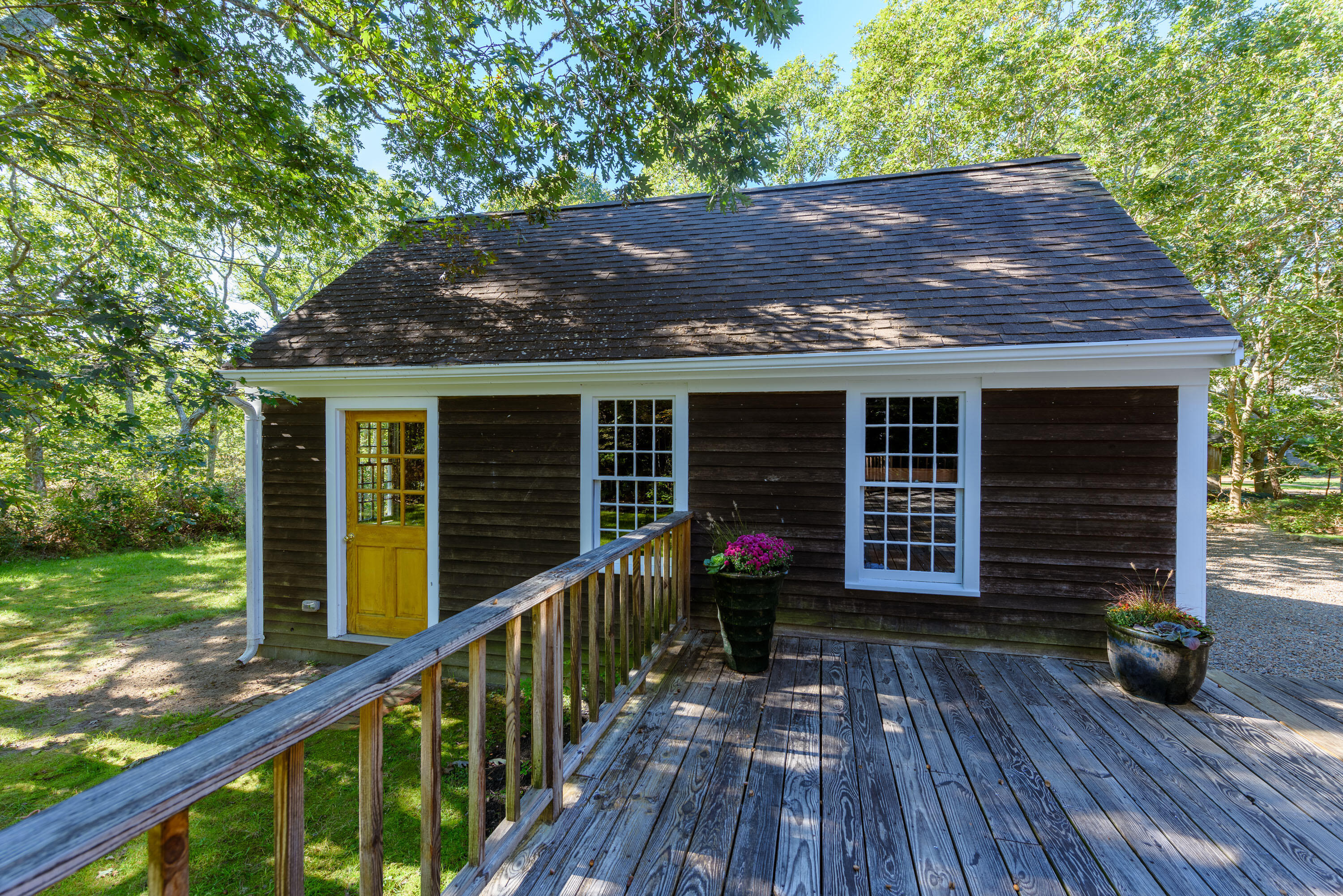 44 Marthas Road Edgartown, MA 02539 - Photo 11 of 30 a view of house with backyard and a garden