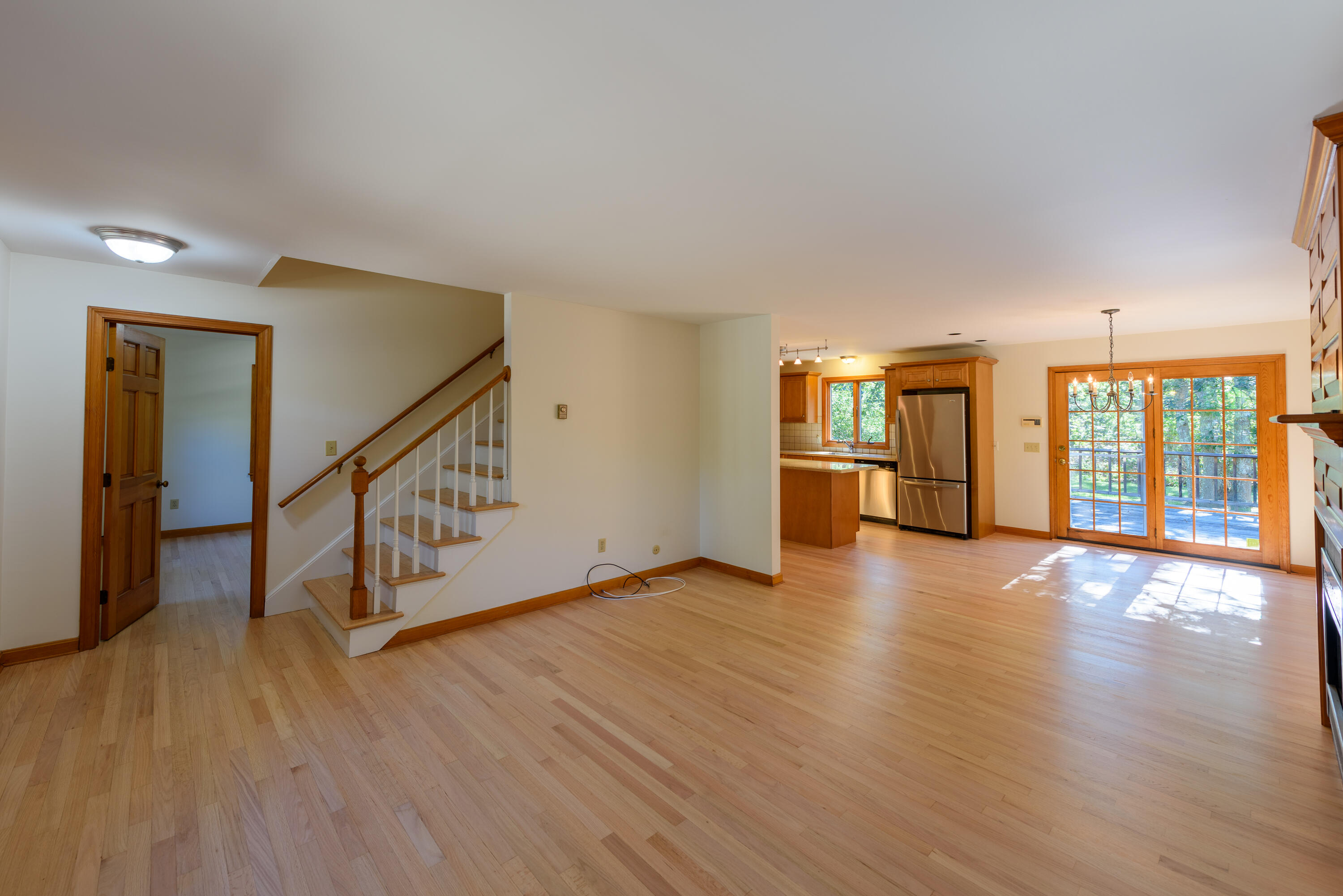44 Marthas Road Edgartown, MA 02539 - Photo 15 of 30 a view of an empty room with wooden floor and a window