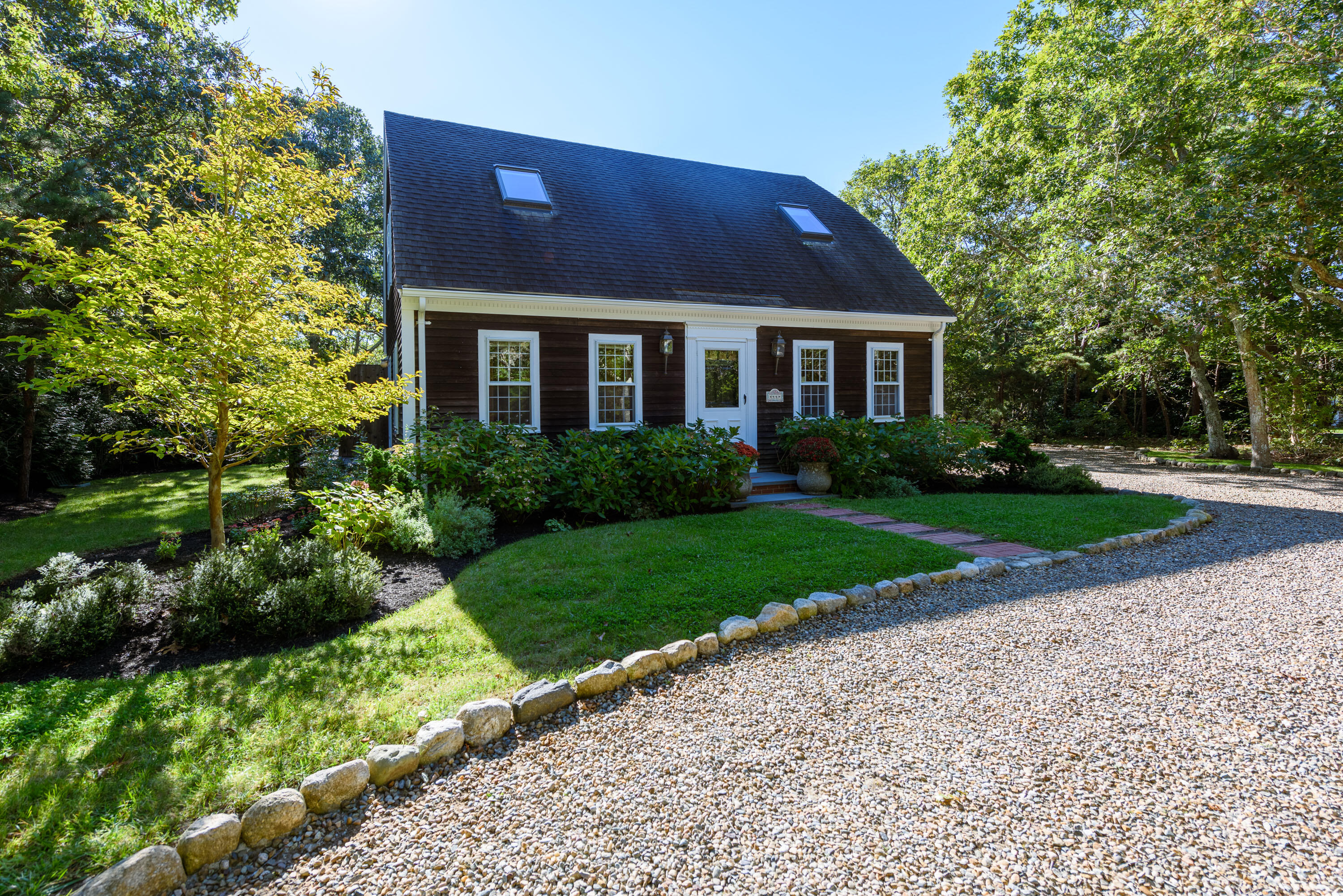 44 Marthas Road Edgartown, MA 02539 - Photo 3 of 30 a front view of a house with a yard