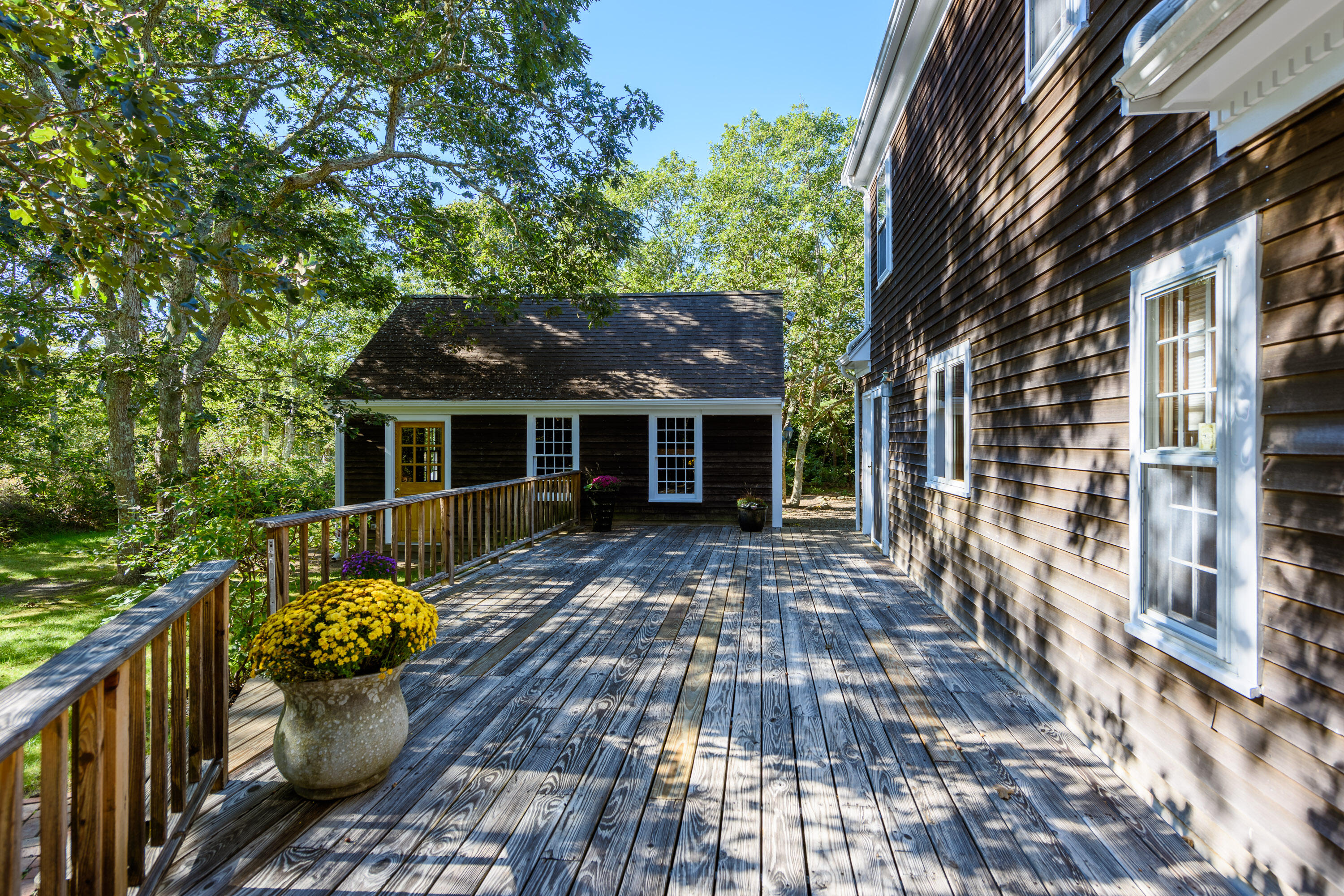 44 Marthas Road Edgartown, MA 02539 - Photo 4 of 30 a front view of a house with a garden