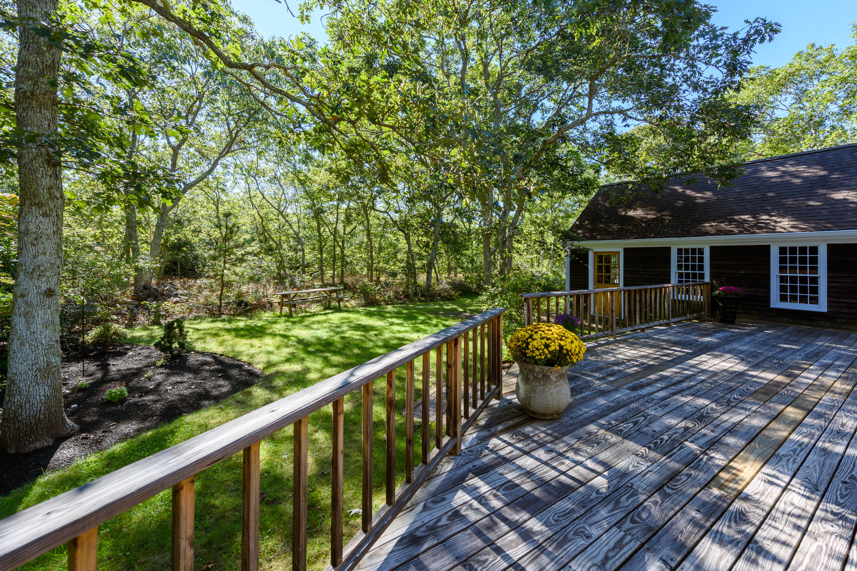 44 Marthas Road Edgartown, MA 02539 - Photo 9 of 30 a view of a two chair in the balcony