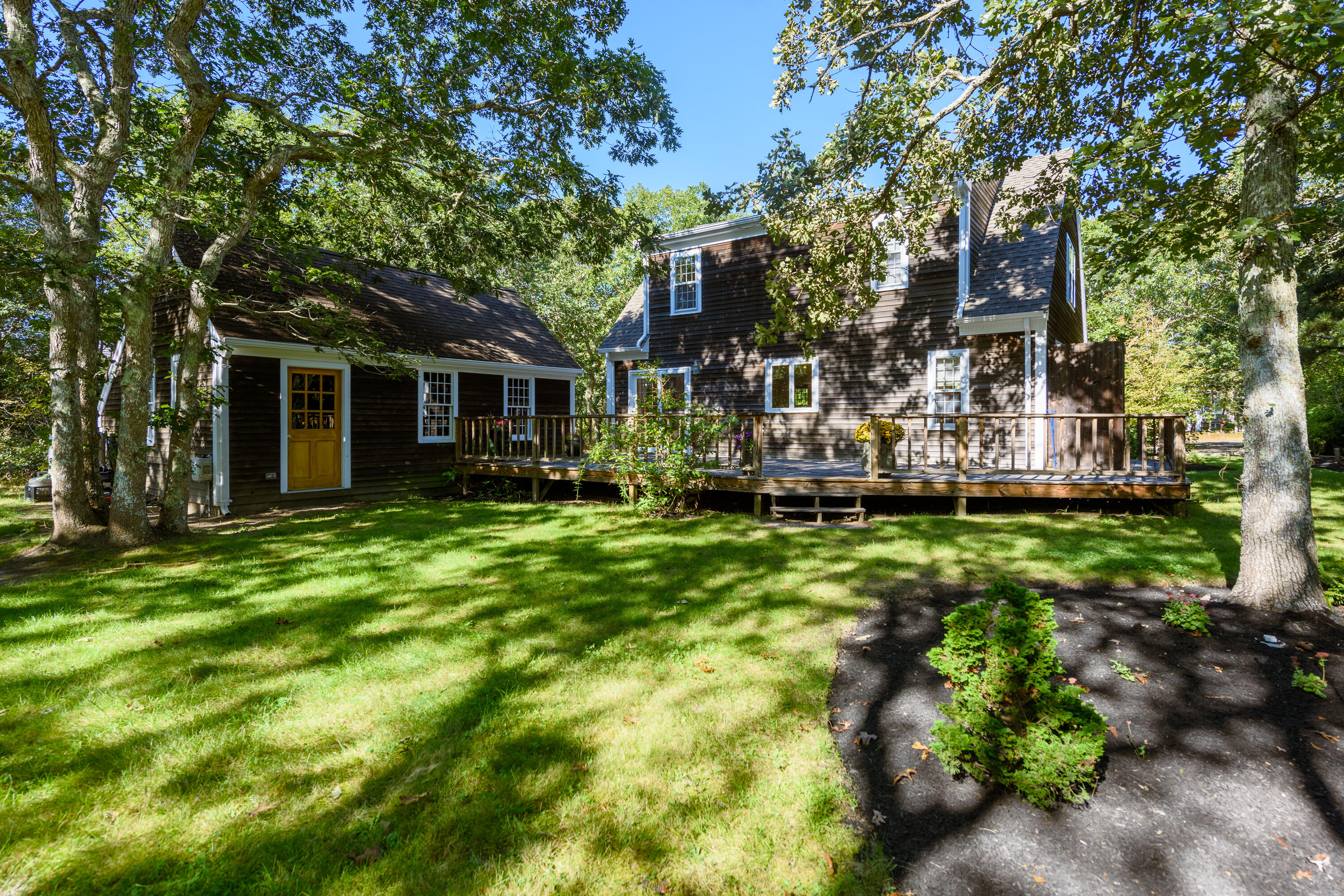 44 Marthas Road Edgartown, MA 02539 - Photo 10 of 30 a front view of a house with a garden