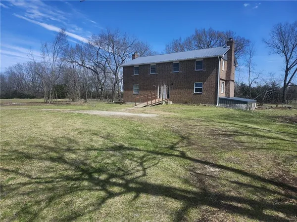 $360,000 | 23779 County Road 1077, Parker, KS 66072