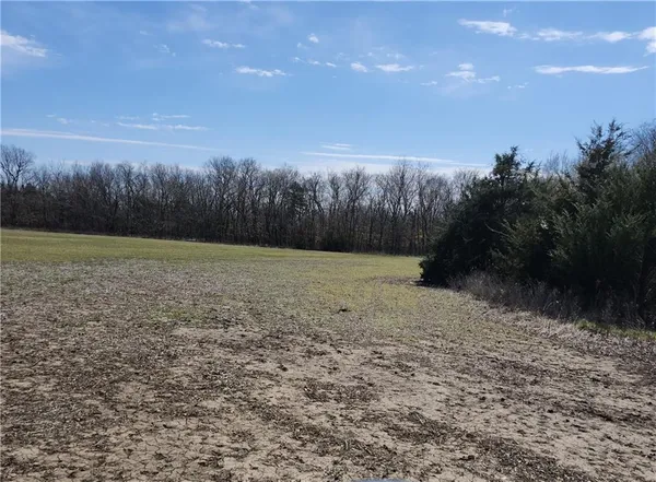 $360,000 | 23779 County Road 1077, Parker, KS 66072