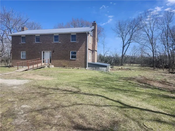 $360,000 | 23779 County Road 1077, Parker, KS 66072