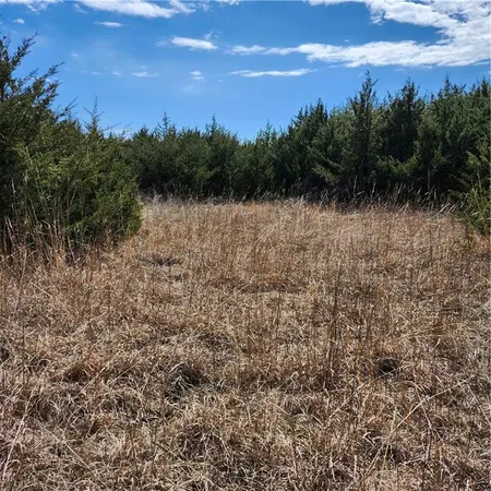 $360,000 | 23779 County Road 1077, Parker, KS 66072