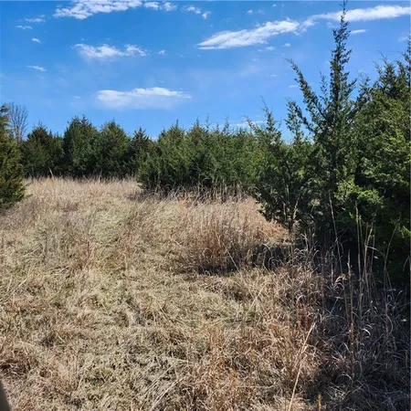 $360,000 | 23779 County Road 1077, Parker, KS 66072