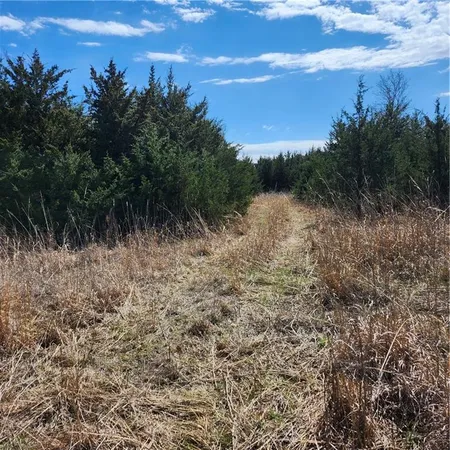 $360,000 | 23779 County Road 1077, Parker, KS 66072