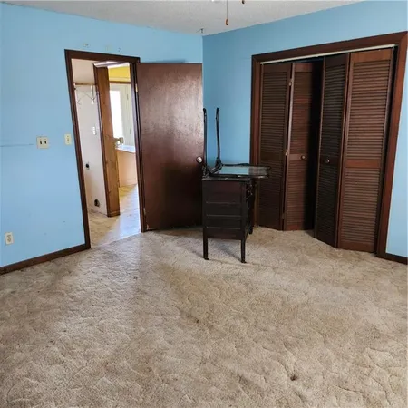 $360,000 | 23779 County Road 1077, Parker, KS 66072