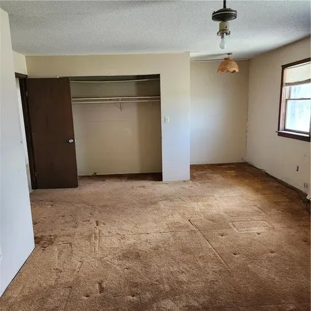 $360,000 | 23779 County Road 1077, Parker, KS 66072