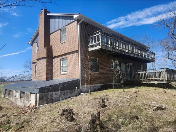 $360,000 | 23779 County Road 1077, Parker, KS 66072