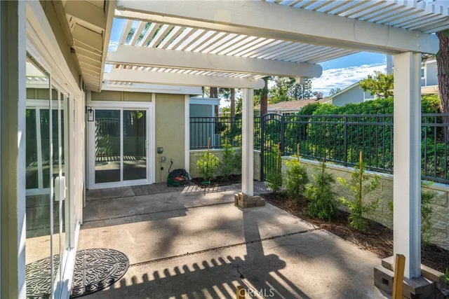 a front view of a building with garden