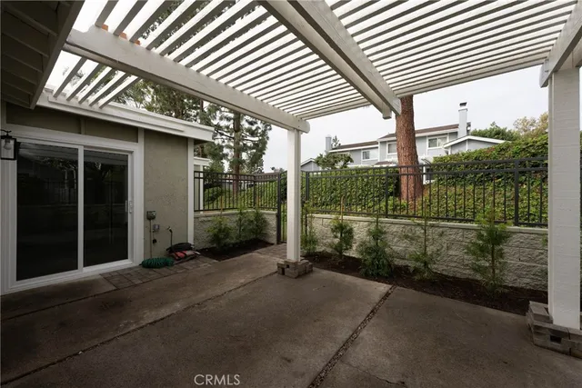 a view of a porch with wooden floor