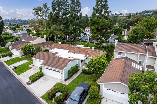 an aerial view of a house with a garden