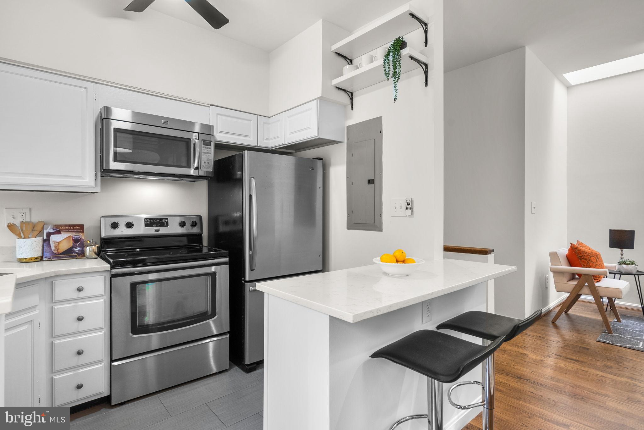 1843 Mintwood Place Northwest, Unit 204 Washington, DC 20009 - Photo 13 of 34 Modern kitchen with sleek appliances.