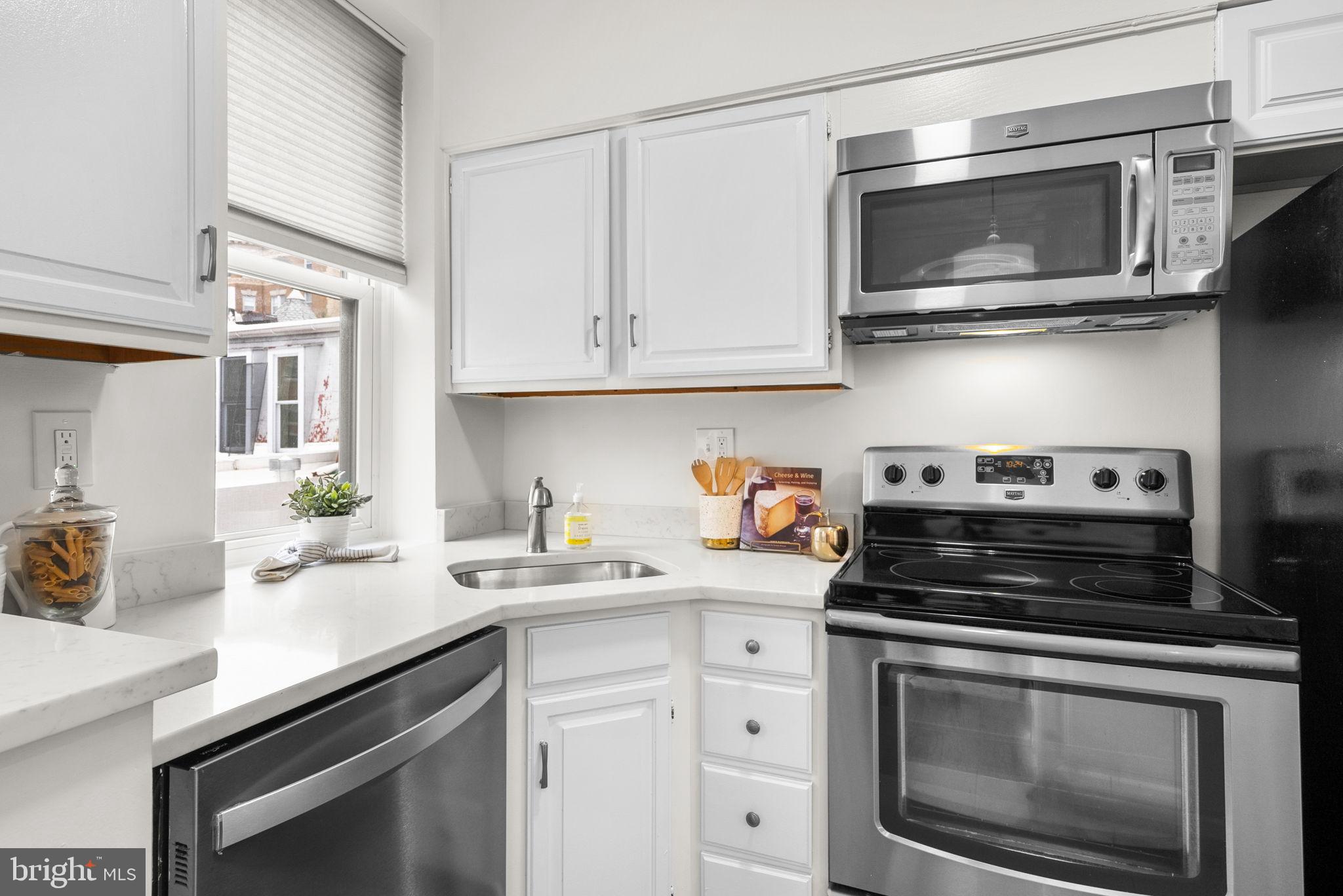 1843 Mintwood Place Northwest, Unit 204 Washington, DC 20009 - Photo 14 of 34 Modern kitchen with sleek appliances.