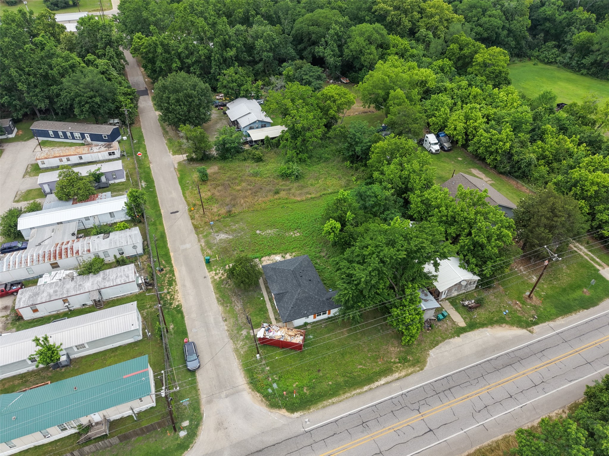 0 Mill Street Willis, TX 77378 - Photo 22 of 24 an aerial view of residential house with outdoor space