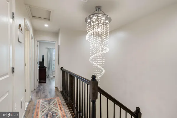 a view of entryway with chandelier