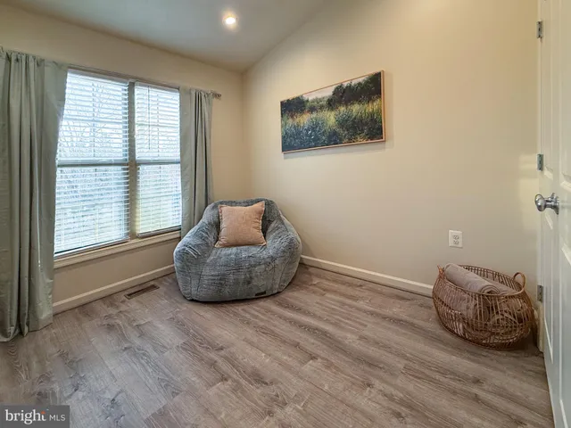 a room with furniture and a window