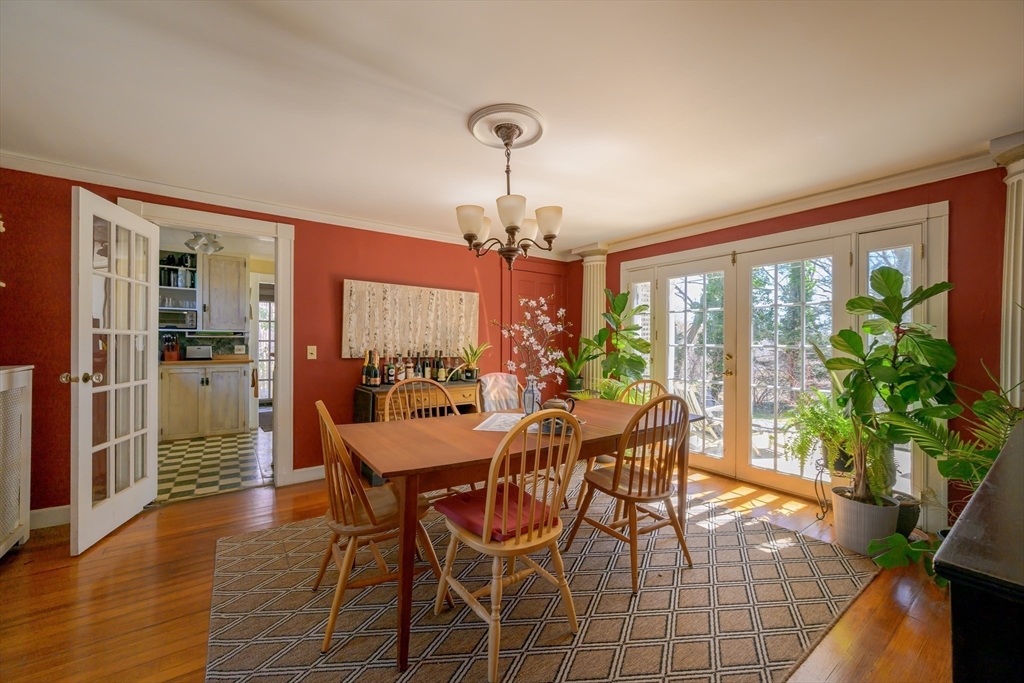 380 South Street Boston, MA 02130 - Photo 12 of 19 a view of a dining room with furniture window and wooden floor