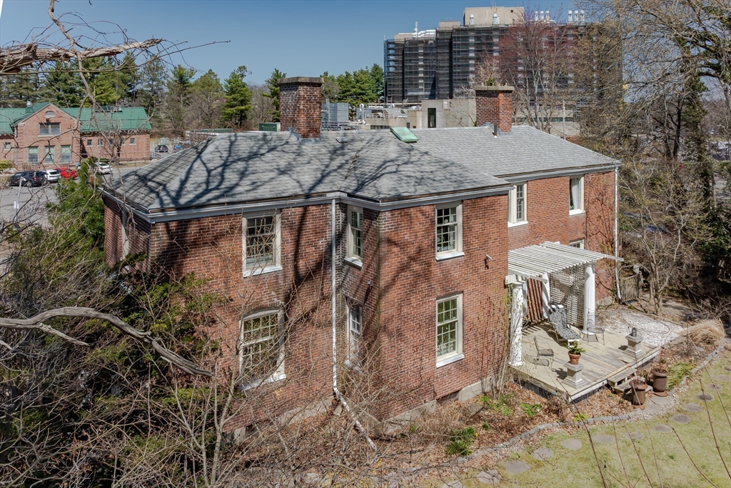 380 South Street Boston, MA 02130 - Photo 2 of 19 a view of a house with roof deck and sitting area