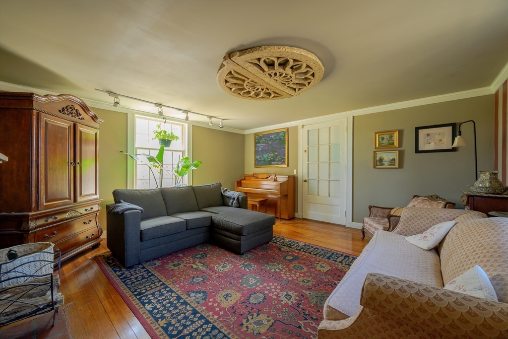 380 South Street Boston, MA 02130 - Photo 9 of 19 a living room with furniture