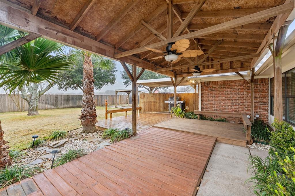 712 North Old Robinson Road Robinson, TX 76706 - Photo 19 of 26 Wooden deck featuring a fenced backyard, ceiling fan, and area for grilling