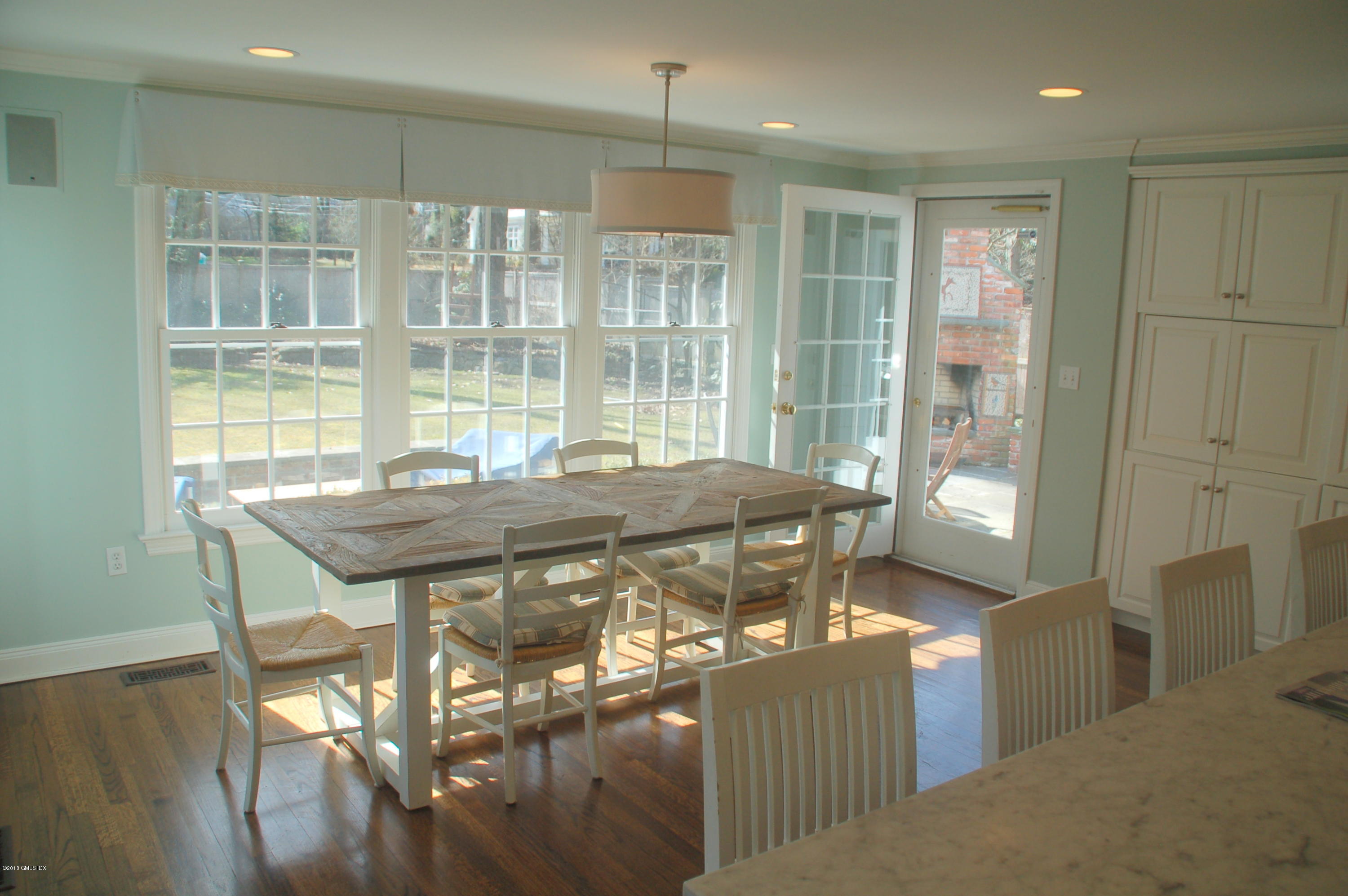 16 Willow Road Riverside, CT 06878 - Photo 11 of 30 a view of a dining room with furniture window and outside view