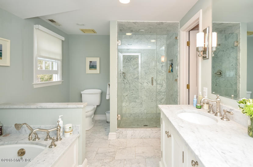 16 Willow Road Riverside, CT 06878 - Photo 15 of 30 a bathroom with a sink a toilet and shower