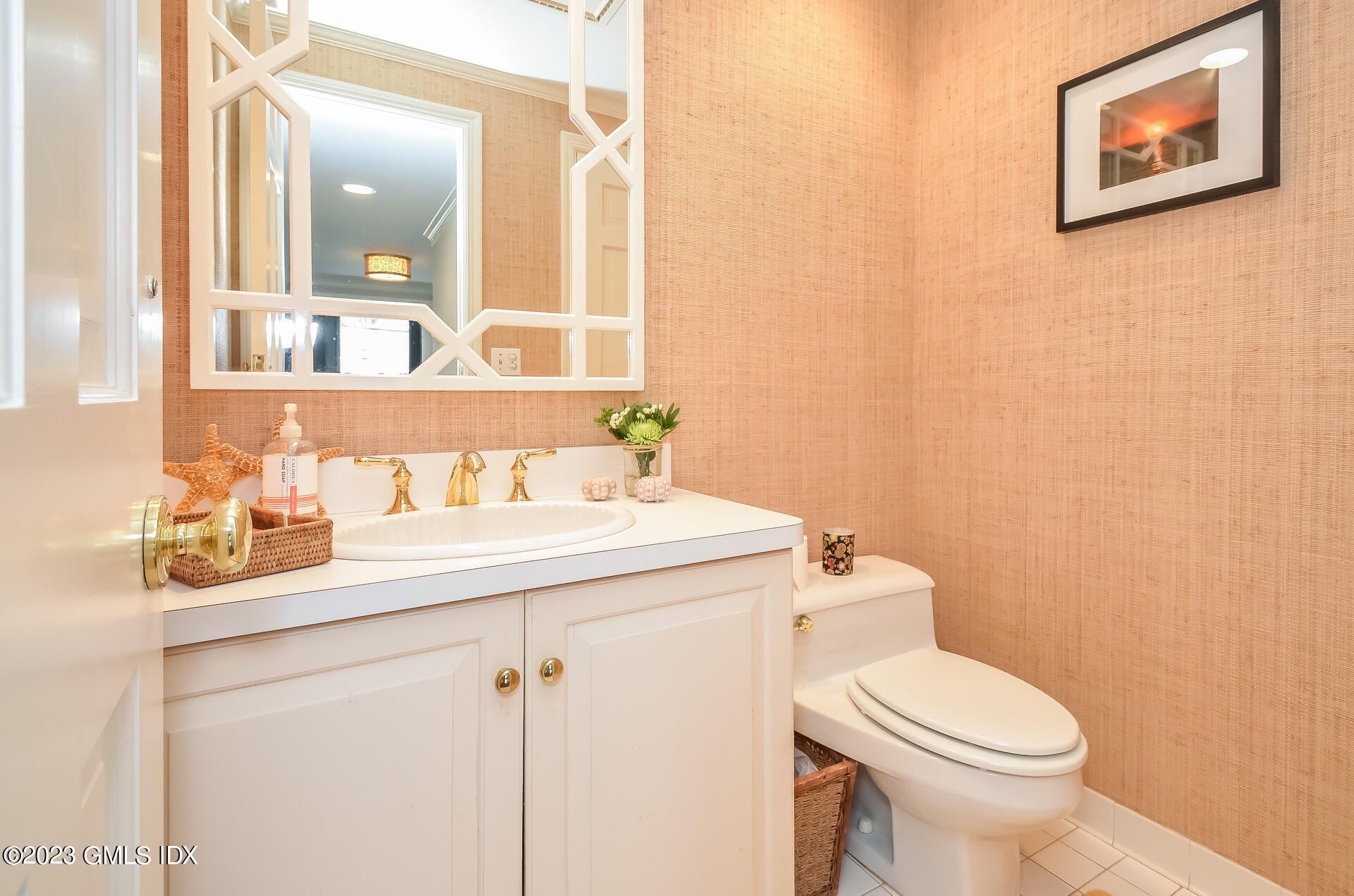 16 Willow Road Riverside, CT 06878 - Photo 18 of 30 a bathroom with a toilet sink and mirror