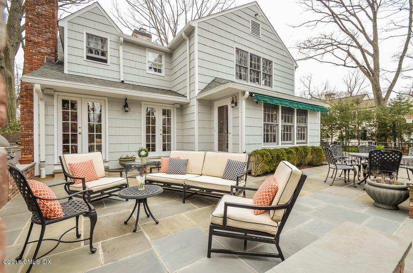 16 Willow Road Riverside, CT 06878 - Photo 2 of 30 a view of a patio with a dining table and chairs